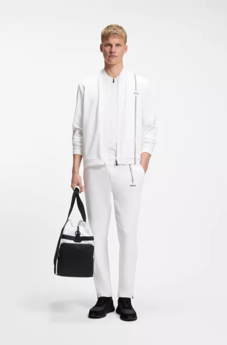 Active tracksuit bottoms in thermoregulating stretch gabardine
