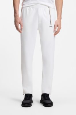Active tracksuit bottoms in thermoregulating stretch gabardine, White