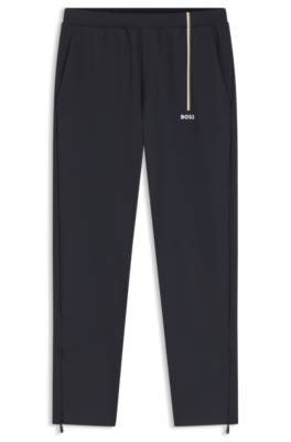 Active tracksuit bottoms in thermoregulating stretch gabardine 1