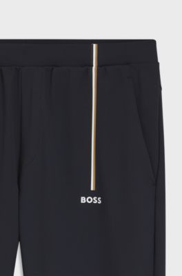 Active tracksuit bottoms in thermoregulating stretch gabardine, Dark Blue