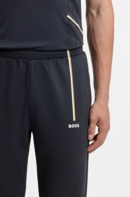 Active tracksuit bottoms in thermoregulating stretch gabardine, Dark Blue