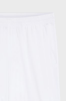 Active Stretch-fabric shorts with mesh pocket bags, White