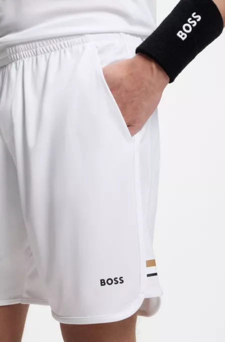 Active Short en tissu stretch avec poches en maille filet