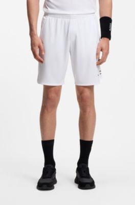 Active Stretch-fabric shorts with mesh pocket bags, White