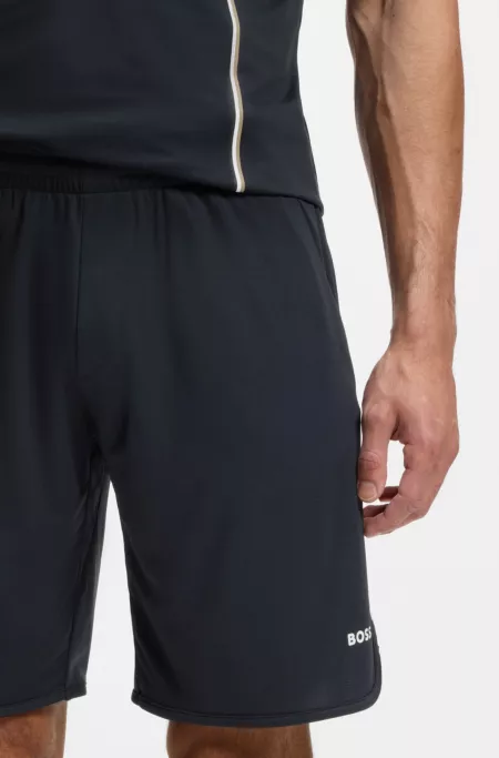 Active Shorts en tejido elástico con bolsillos amplios de malla