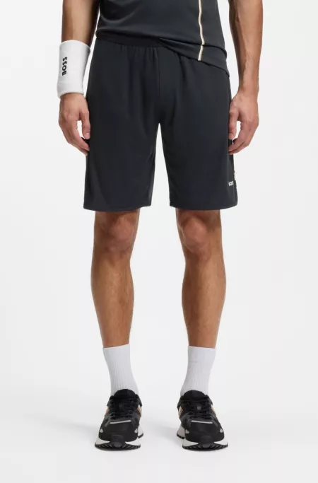 Active Shorts en tejido elástico con bolsillos amplios de malla