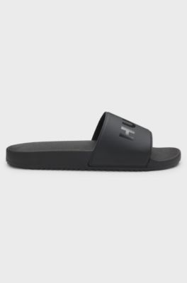 In Itali&euml; vervaardigde slippers met ton-sur-ton logo, Zwart