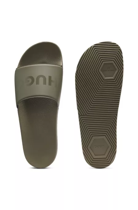 Mules confectionnées en Italie avec logo ton sur ton