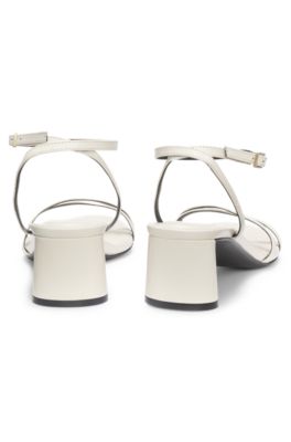 Strappy sandals in leather with block heel, White