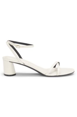 Strappy sandals in leather with block heel, White