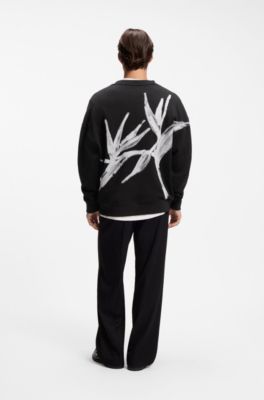 Sudadera de algod&oacute;n con logo bordado y estampado gr&aacute;fico, Negro