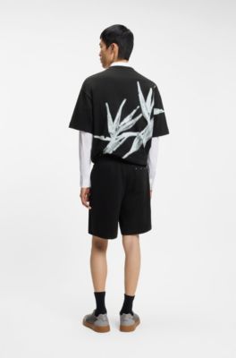 Bermuda in terry di cotone con patch grafico, Nero
