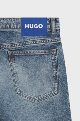 Jeans slim fit in denim elasticizzato blu effetto stone-washed, Blu