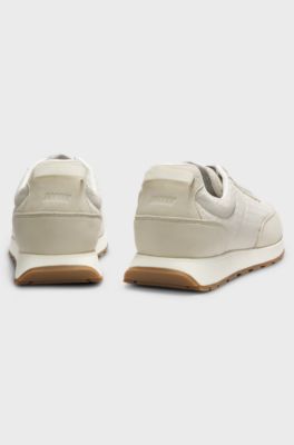 Running-inspired trainers with monogram-jacquard uppers, Light Beige