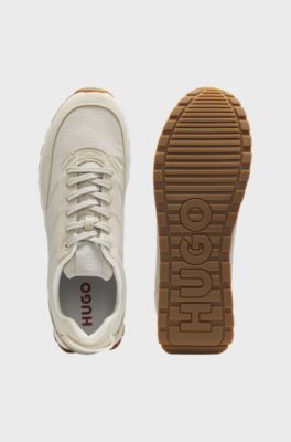Running-inspired trainers with monogram-jacquard uppers, Light Beige