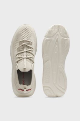 Stickade sneakers med EVA-sula och pr&auml;glad logga, Ljusbeige
