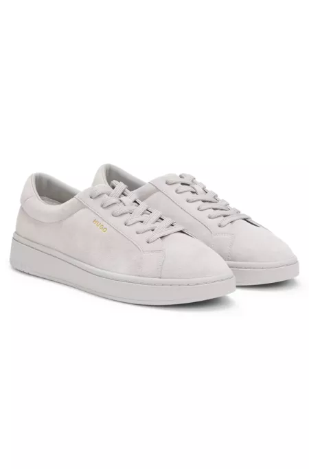 Suede trainers with gold-tone foil logo