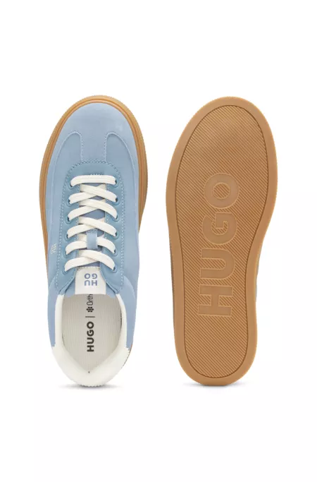 Suede trainers with stacked logos