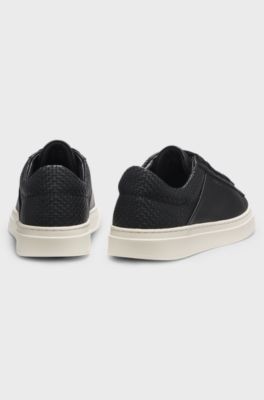 Low-top trainers with grained and woven effects, Black