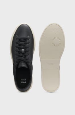 Low-top trainers with grained and woven effects, Black