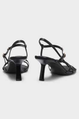 Strappy sandals in leather with asymmetric heel, Black