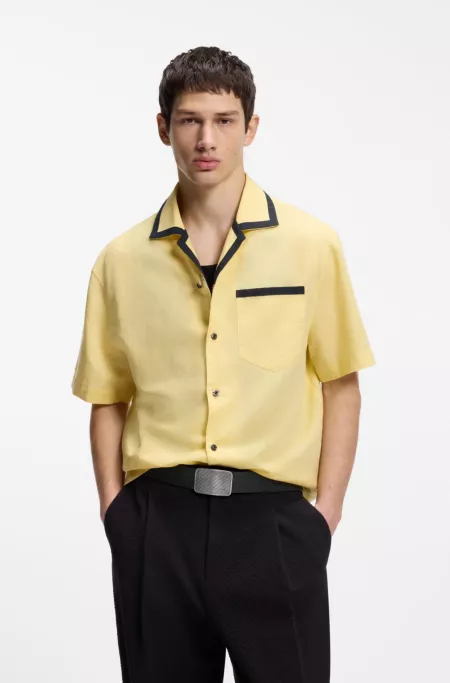 Leather belt with repeat-logo plaque buckle