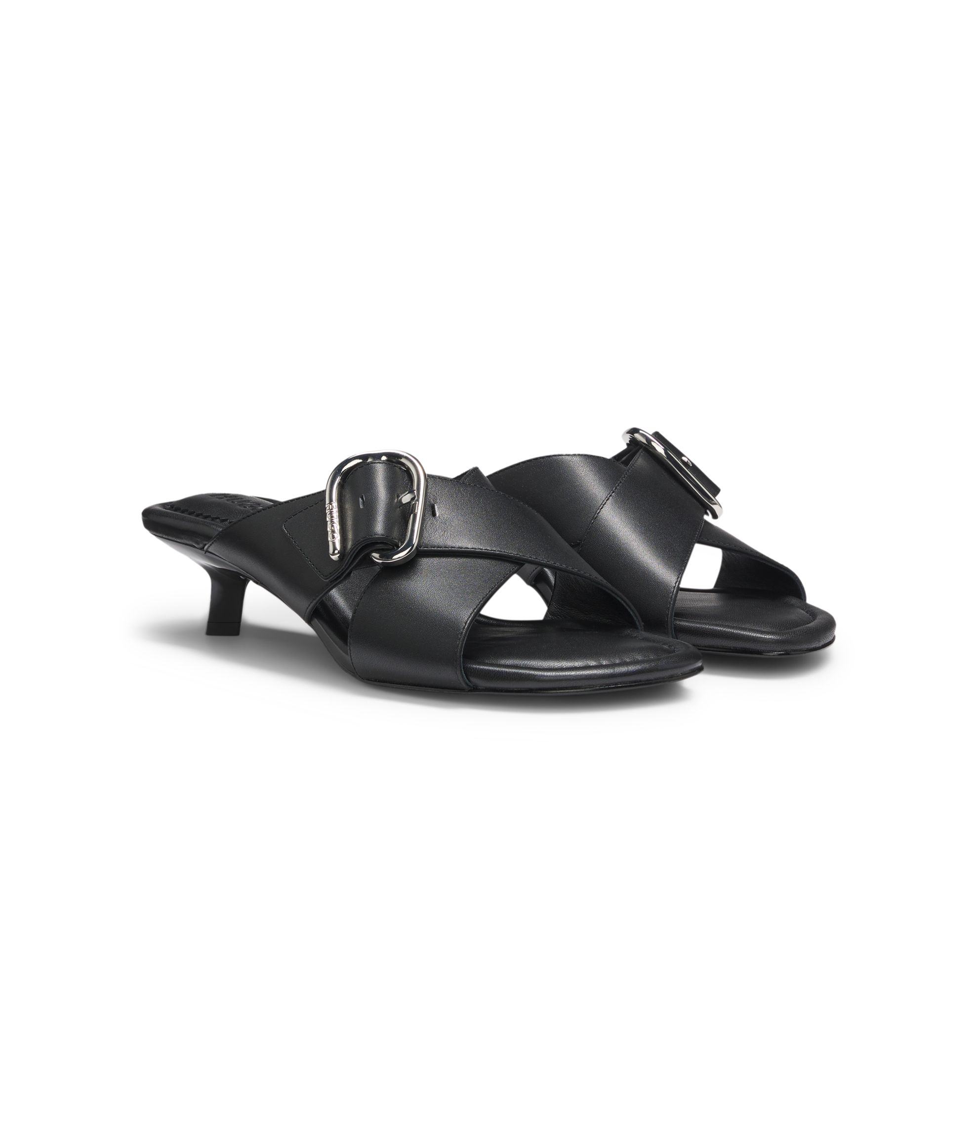 Mules aus Leder mit gekreuzten Schnallenriemen