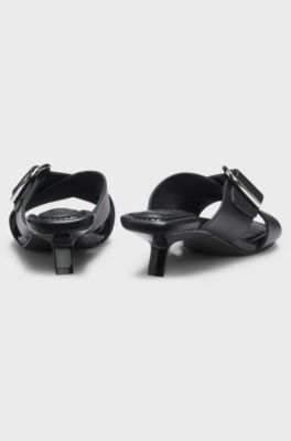 Mules in pelle con cinturini incrociati con fibbia, Nero