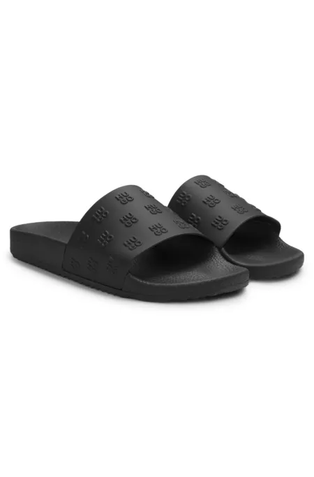 Slides mit wiederholtem Stack-Logo auf dem Obermaterial