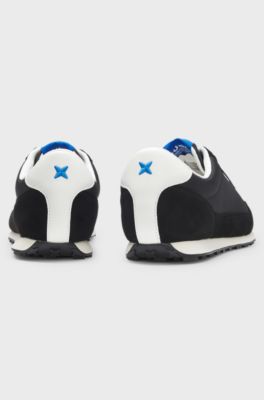 Sneakers i teksturstof med stjernedetalje, Sort