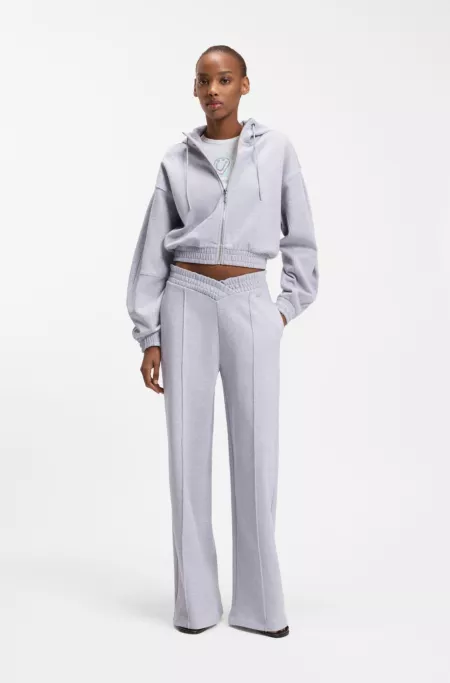 Relaxed-fit tracksuit bottoms in cotton with crossed waistband
