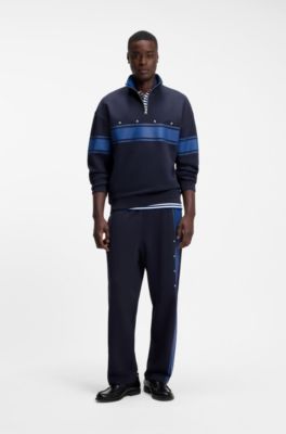 Relaxed-fit tracksuit bottoms in cotton with side stripe, Dark Blue