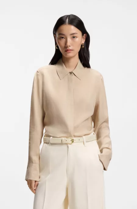 Woven belt with leather trims