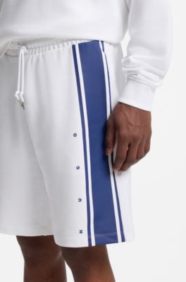 Bermuda relaxed fit in terry di cotone con striscia laterale, Bianco