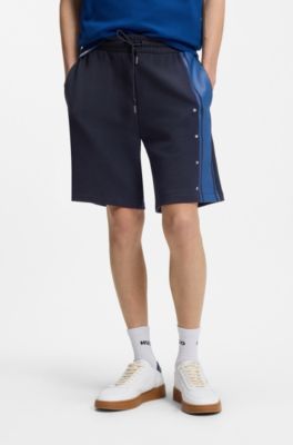 Bermuda relaxed fit in terry di cotone con striscia laterale, Blu scuro