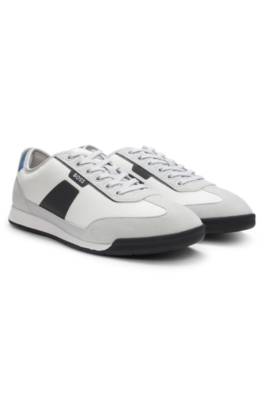 Mixed-material trainers with ridged outsole 1