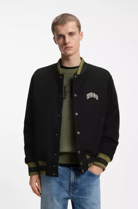 Varsity jacket in cotton corduroy with logo patch