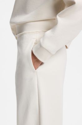 Relaxed-fit cotton joggers with embroidered logo, Natural