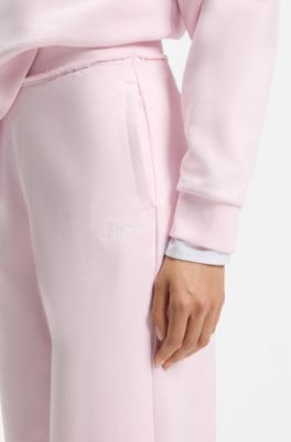 Relaxed-fit cotton joggers with embroidered logo, light pink