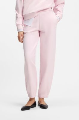 Relaxed-fit cotton joggers with embroidered logo, light pink