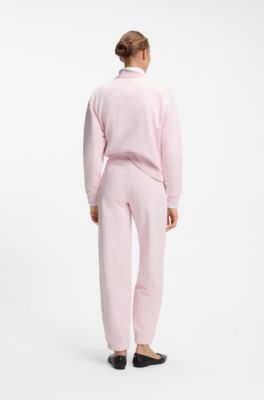 Relaxed-fit cotton joggers with embroidered logo, light pink