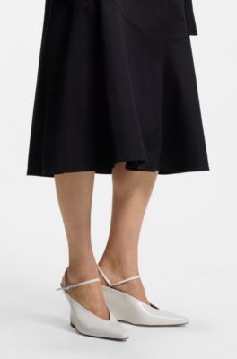 Mules en cuir brillant &agrave; talon compens&eacute; et sangle, Blanc