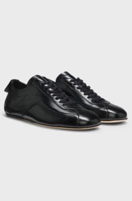 Sneakers in nappa con logo impresso, Nero