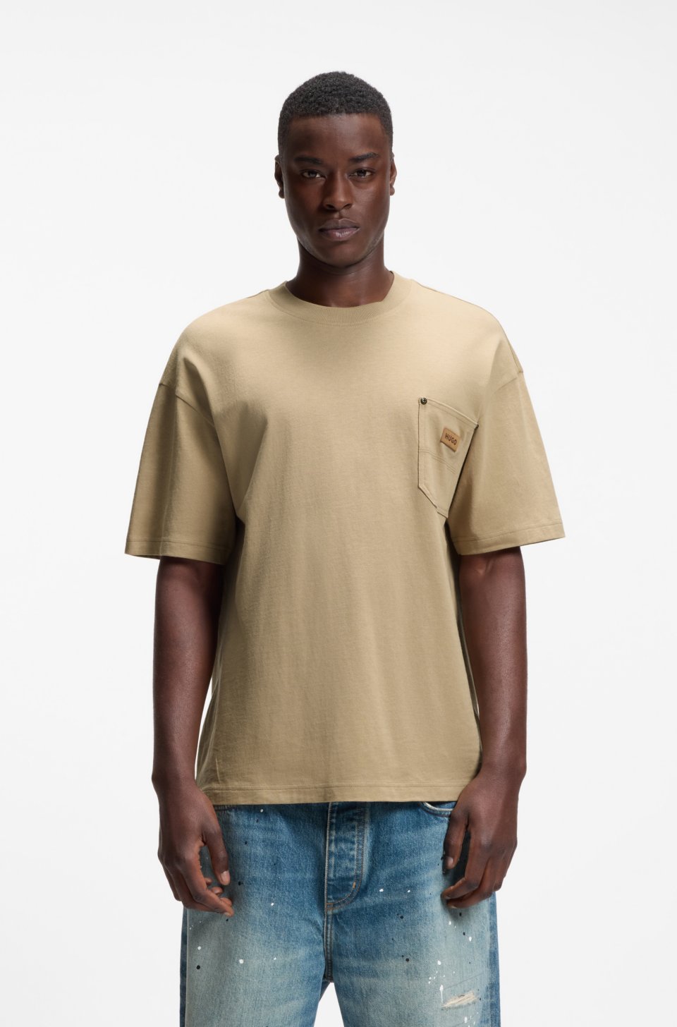Loose-fit T-shirt in cotton with suede logo badge
