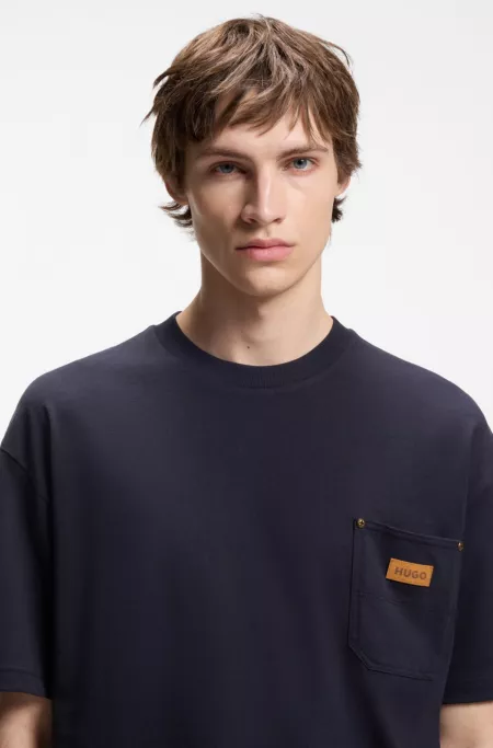 Loose-fit T-shirt in cotton with suede logo badge