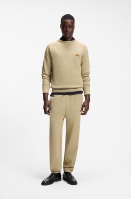 Cotton-terry tracksuit bottoms with logo badge, Beige