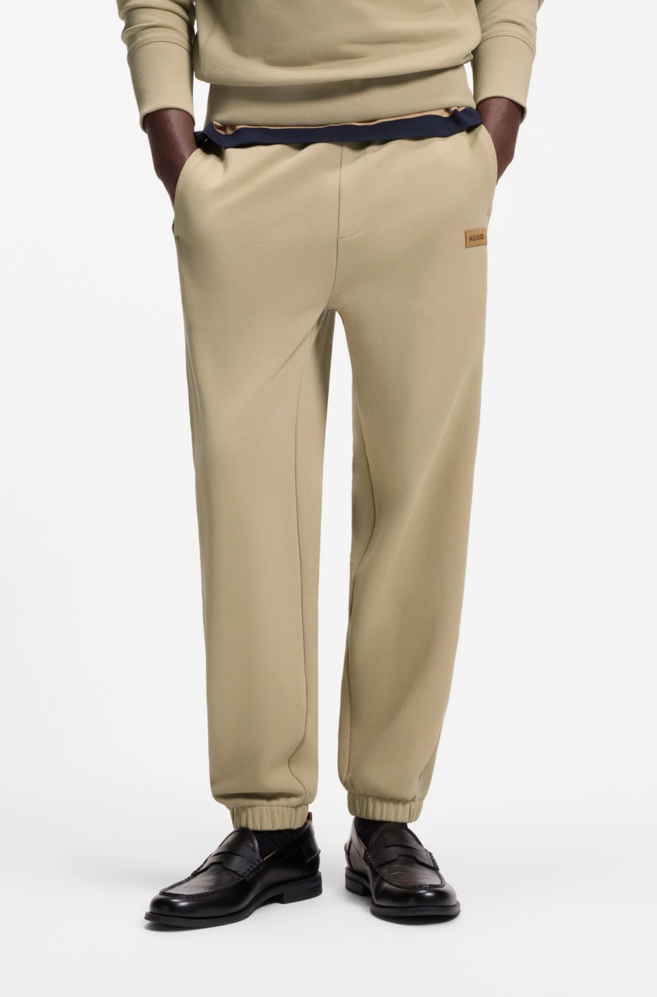 Cotton-terry tracksuit bottoms with logo badge
