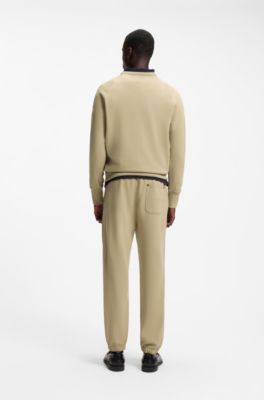 Cotton-terry tracksuit bottoms with logo badge, Beige