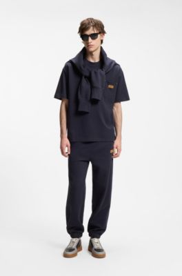 Cotton-terry tracksuit bottoms with logo badge, Dark Blue