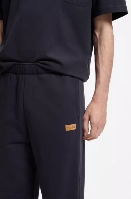 Cotton-terry tracksuit bottoms with logo badge